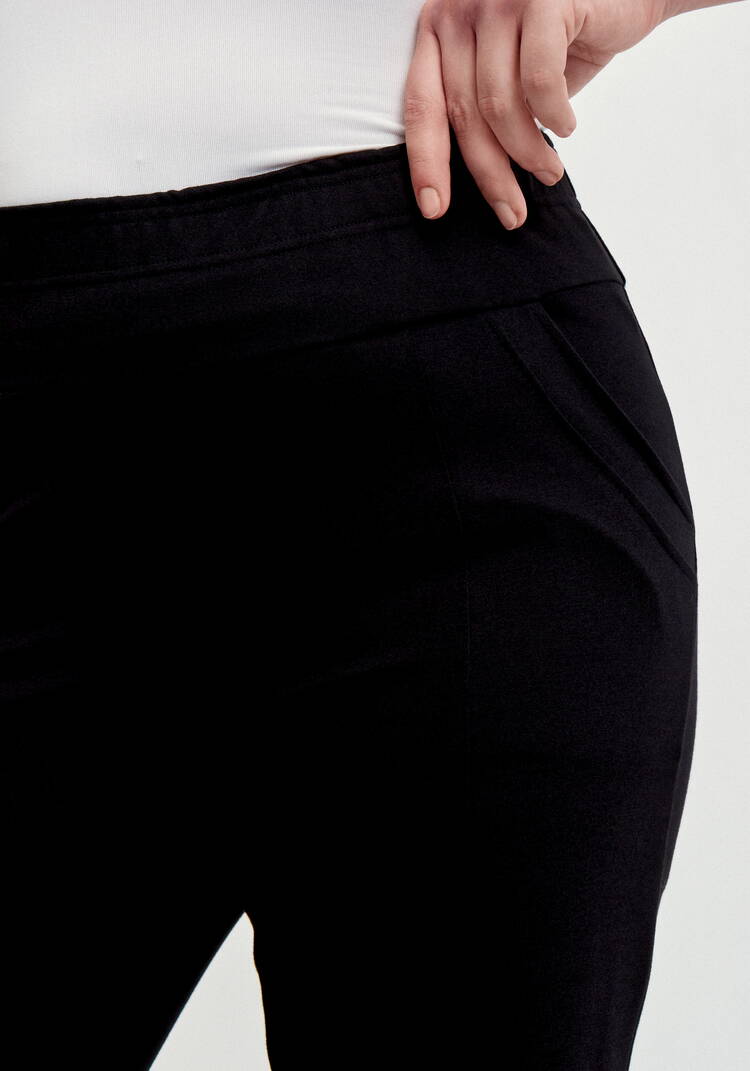 Брюки с эффектом утяжки и декором по низу шир.  750, рис. 5