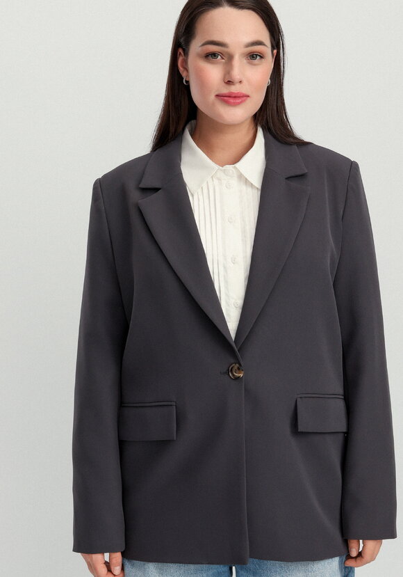 Пиджак однобортный на подкладке шир.  580, рис. 33