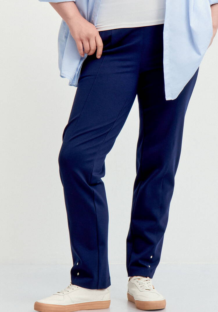 Брюки с эффектом утяжки и декором по низу шир.  750, рис. 10