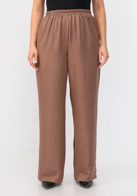 Брюки свободного кроя на резинке по поясу шир.  580, рис. 4