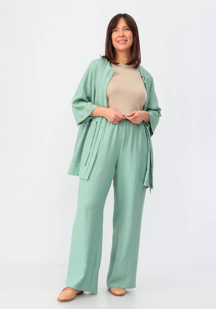 Брюки свободного кроя на резинке по поясу шир.  750, рис. 11