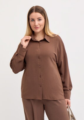 Рубашка свободного кроя с ассиметричным низом