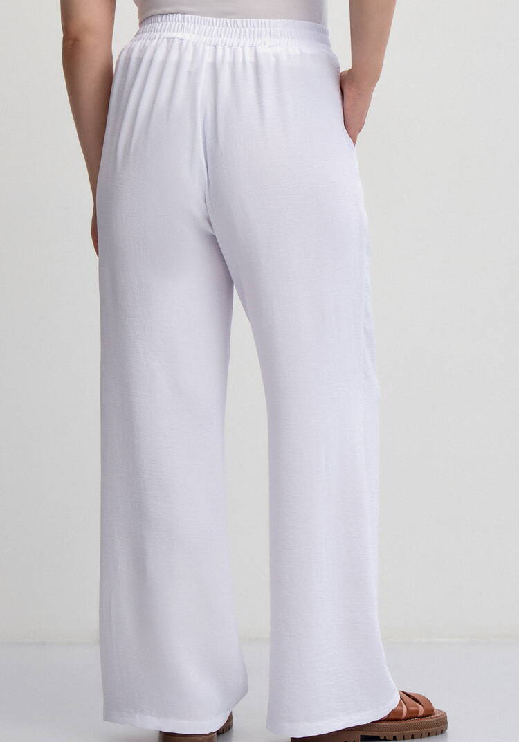 Брюки палаццо на резинке с карманами шир.  750, рис. 21