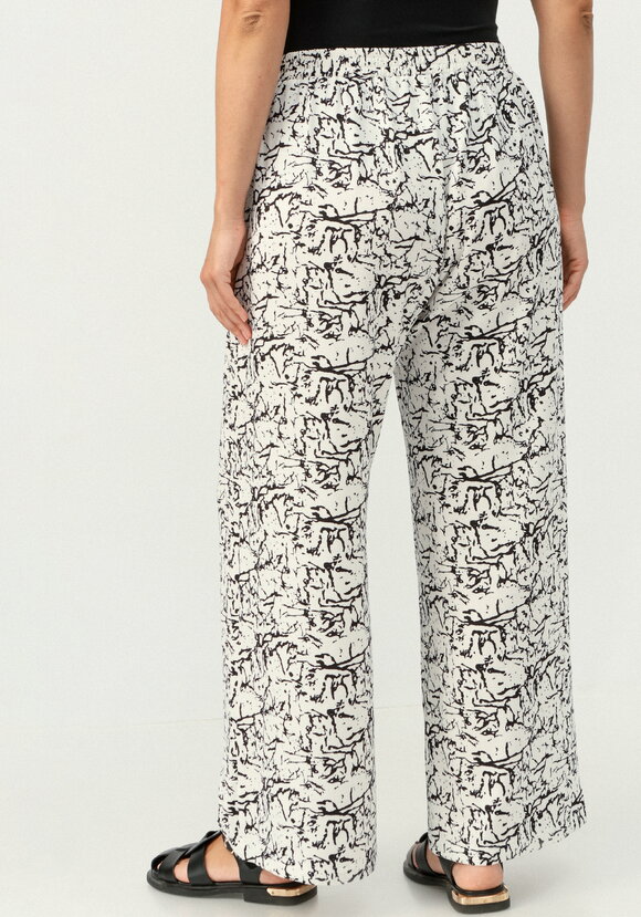 Брюки свободные с анималистичным принтом шир.  580, рис. 9