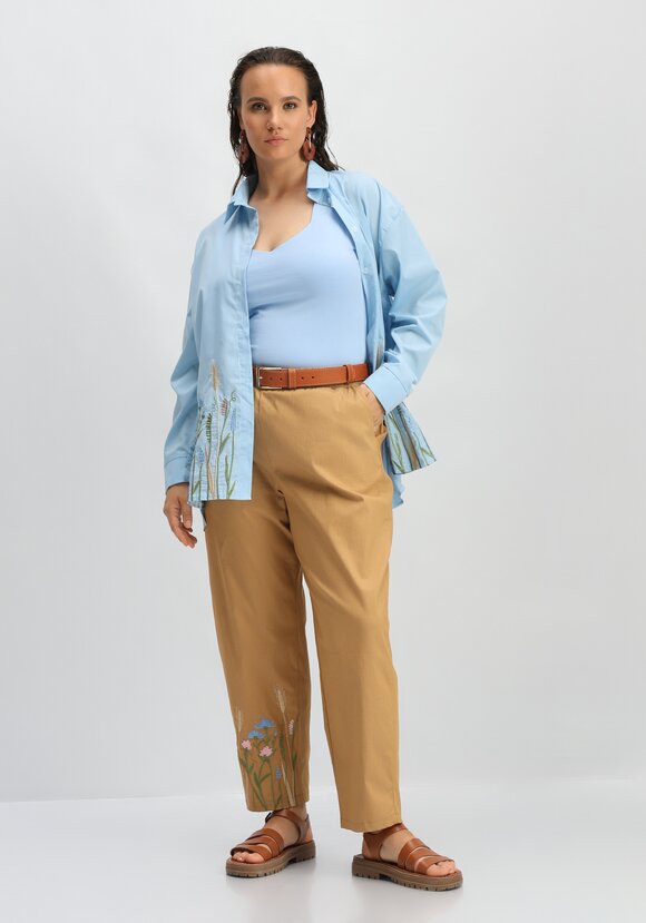 Брюки с вышивкой по низу шир.  580, рис. 9