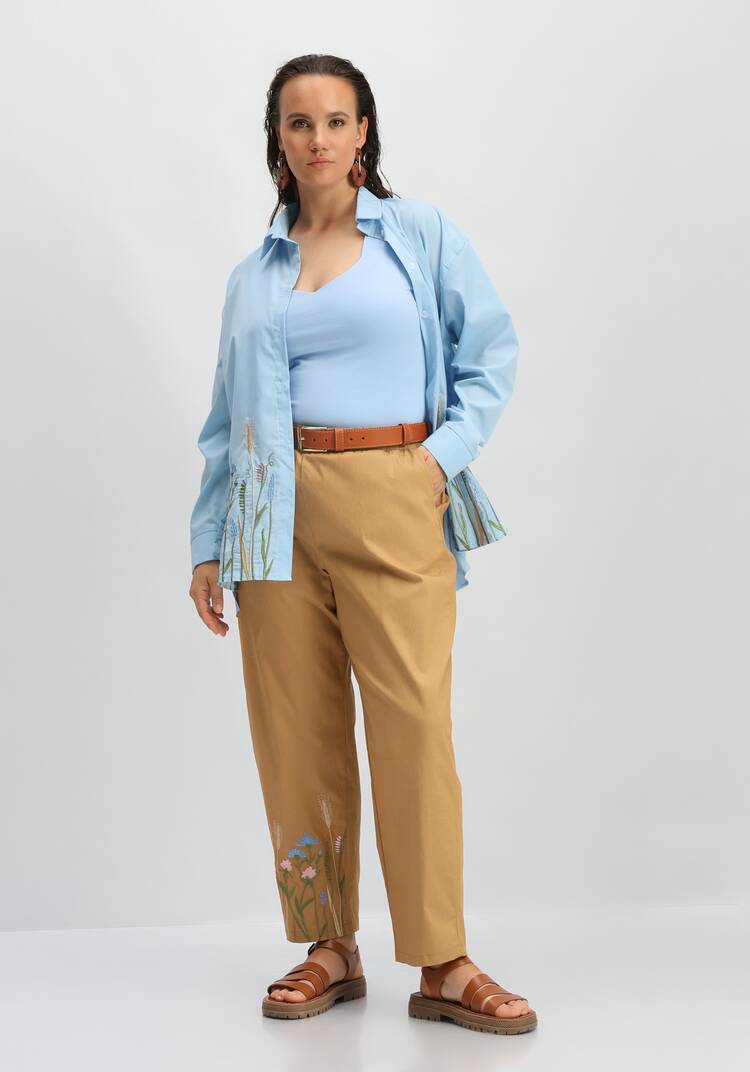 Брюки с вышивкой по низу шир.  750, рис. 9