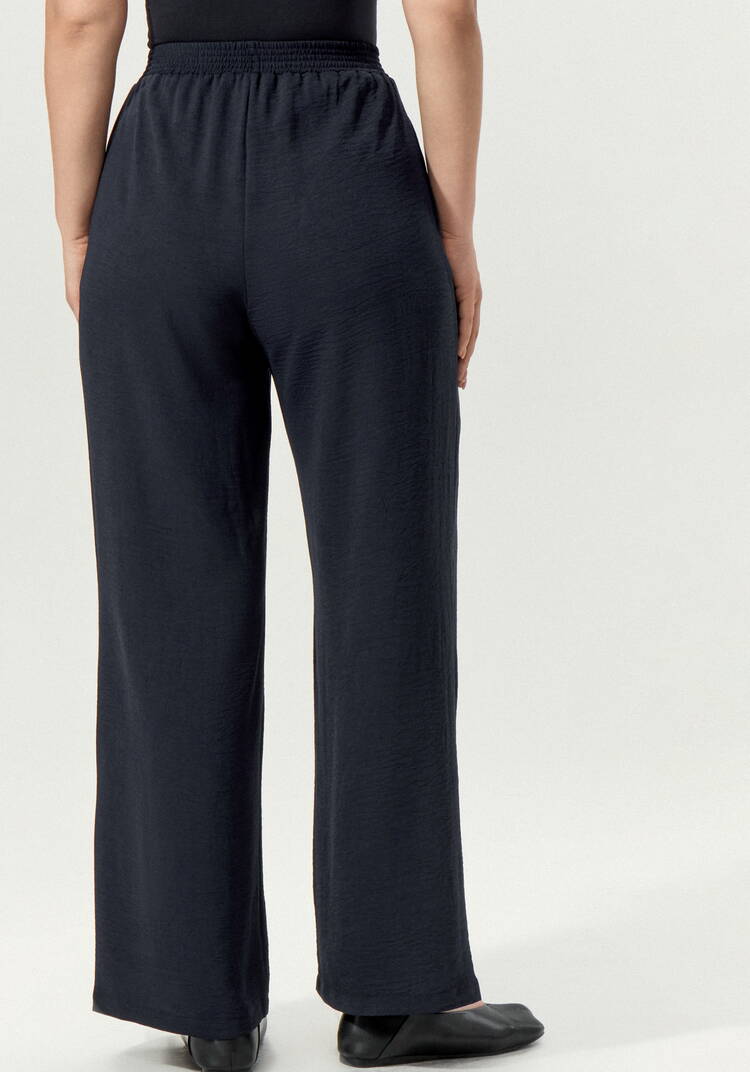 Брюки свободные на резинке по поясу шир.  750, рис. 18