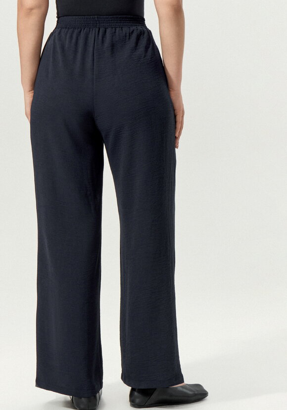 Брюки свободные на резинке по поясу шир.  580, рис. 18