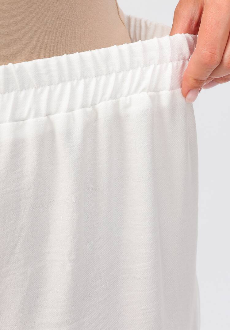 Брюки свободного кроя на резинке по поясу шир.  750, рис. 37