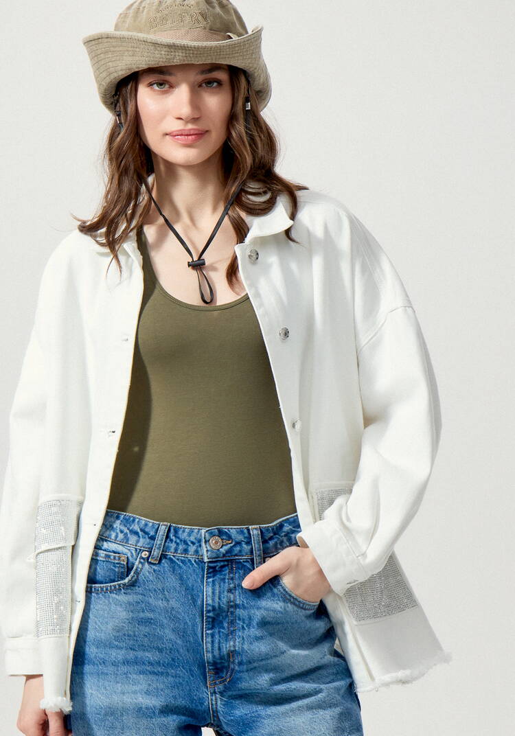 Джинсовая куртка со стразами на карманах шир.  750, рис. 39