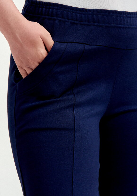 Брюки с эффектом утяжки и декором по низу шир.  580, рис. 13