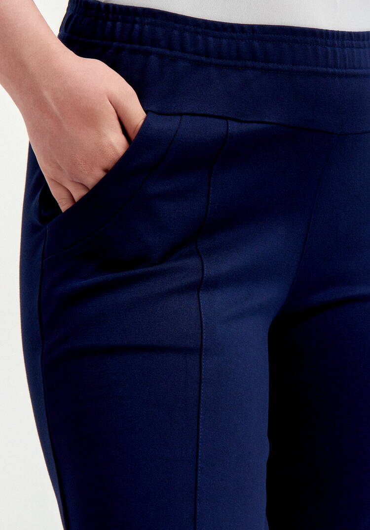 Брюки с эффектом утяжки и декором по низу шир.  750, рис. 13