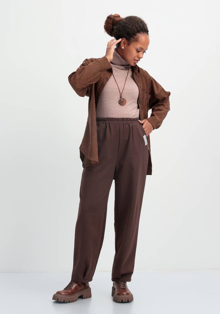 Брюки трикотажные с защипами по низу шир.  750, рис. 18