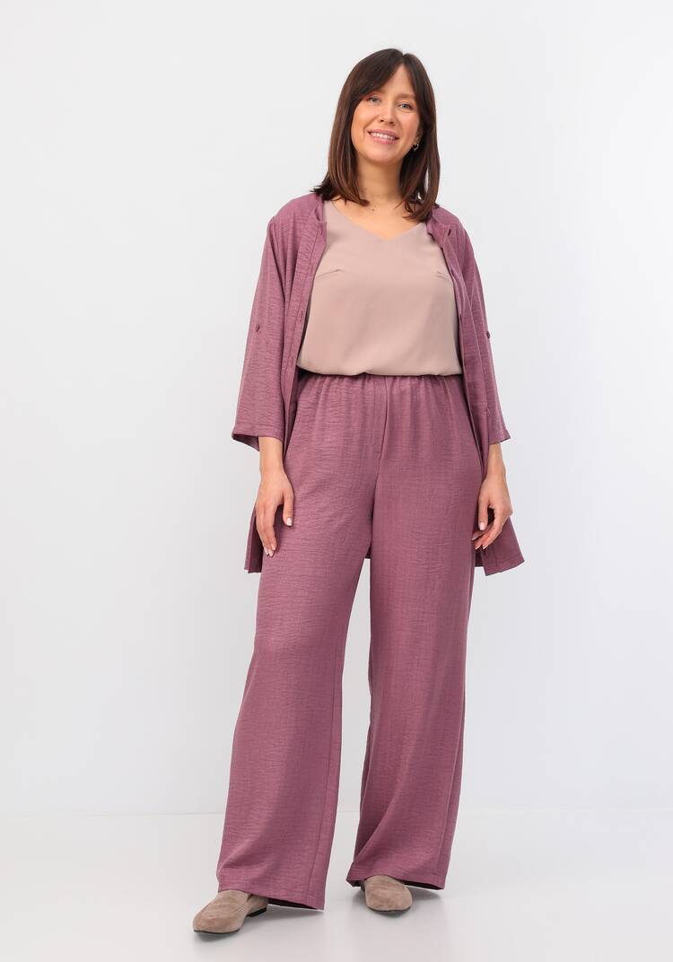 Брюки свободного кроя на резинке по поясу шир.  750, рис. 22