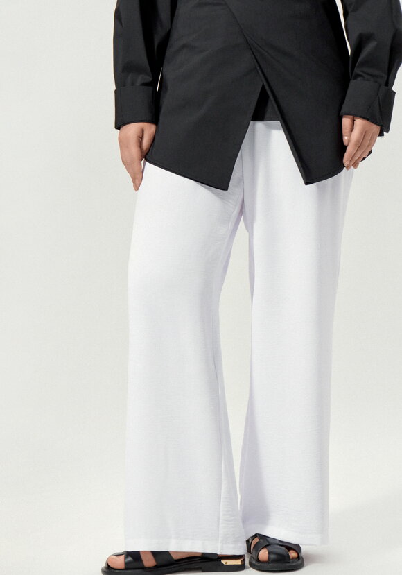 Брюки свободные на резинке по поясу шир.  580, рис. 9