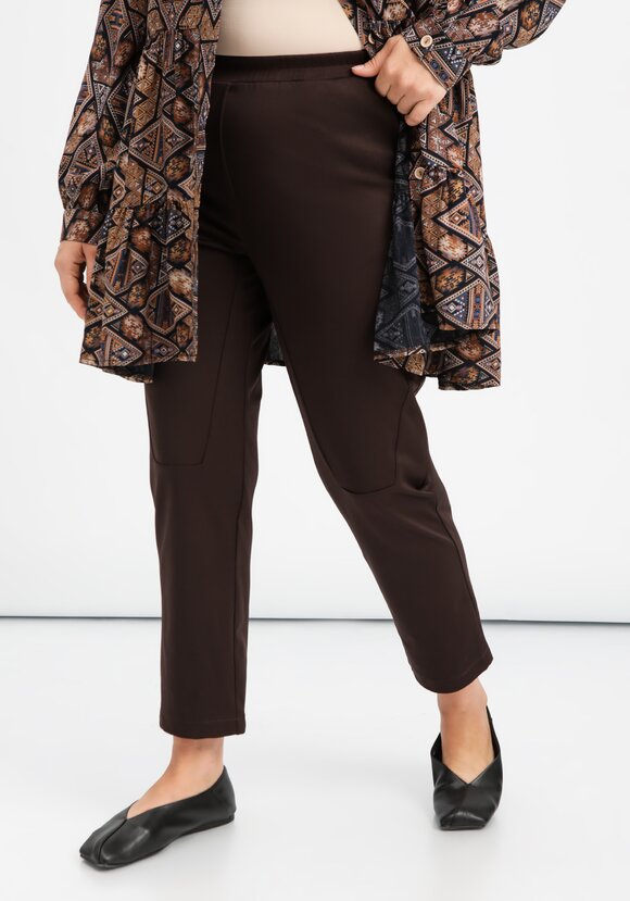 Брюки оригинального кроя на резинке шир.  580, рис. 10