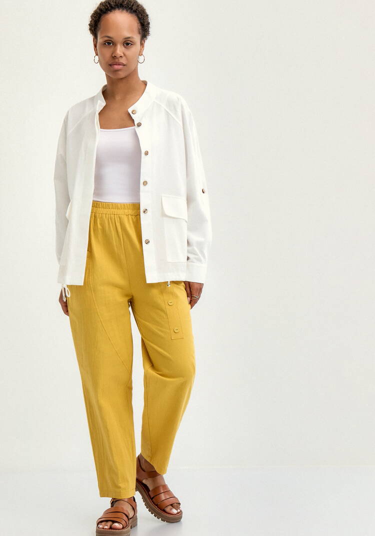 Брюки с декоративной планкой и карманами шир.  750, рис. 40