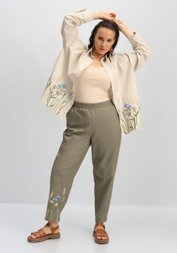 Брюки с вышивкой по низу шир.  580, рис. 35