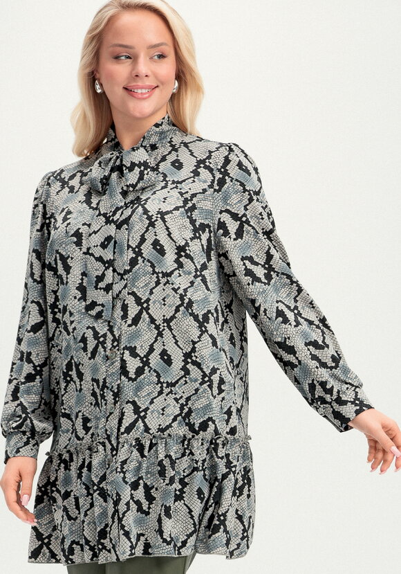 Туника свободного кроя с воланом по низу шир.  580, рис. 15