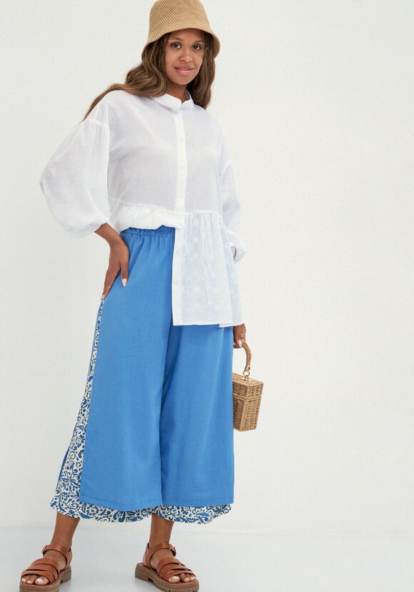 Брюки комбинированные длиной 7/8 шир.  580, рис. 23