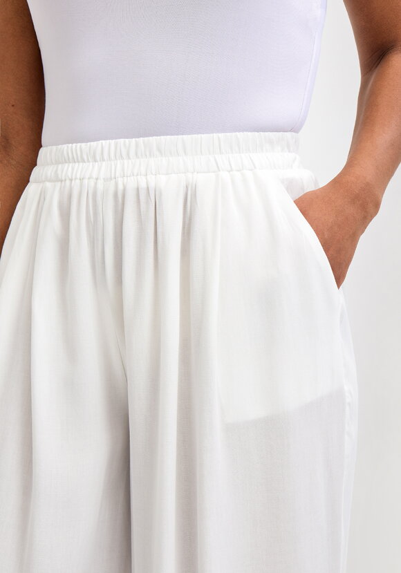 Брюки свободного кроя на резинке по низу шир.  580, рис. 5