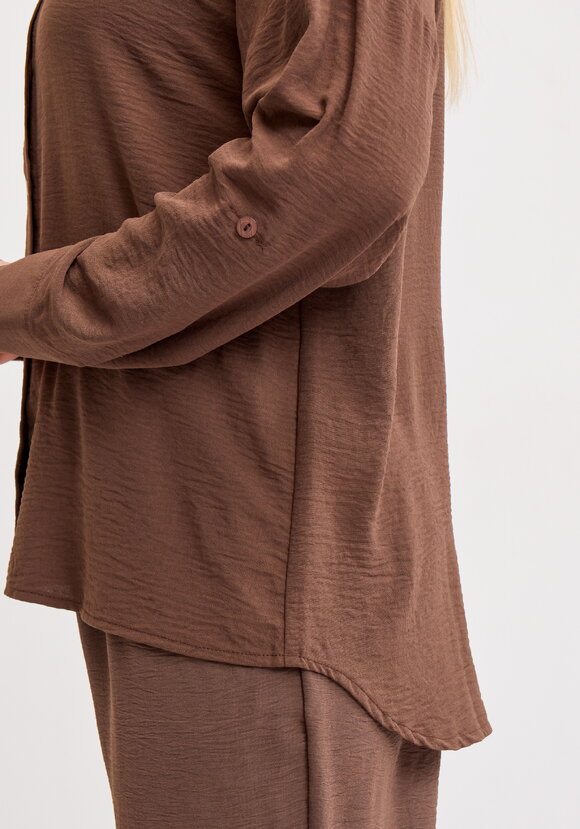 Рубашка свободного кроя с ассиметричным низом шир.  580, рис. 36