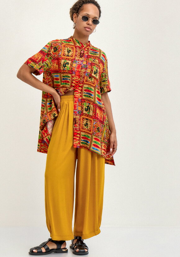 Брюки свободного кроя на резинке по низу шир.  580, рис. 15