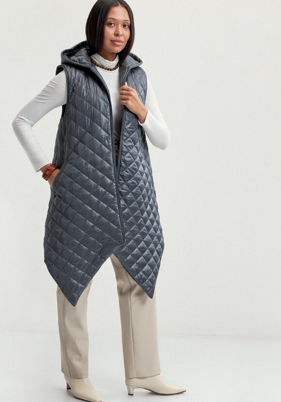 Жилет стёганый с ассиметричным низом шир.  580, рис. 12