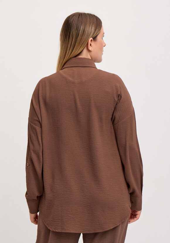 Рубашка свободного кроя с ассиметричным низом шир.  580, рис. 33