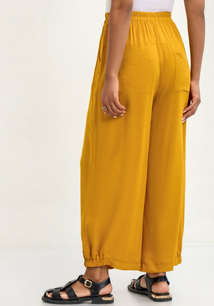 Брюки свободного кроя на резинке по низу шир.  750, рис. 11