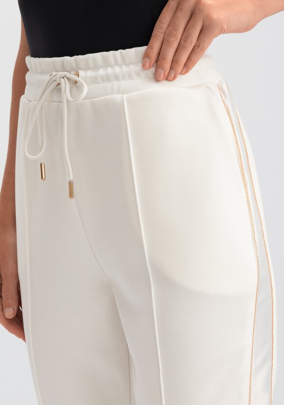 Брюки на резинке с лампасами и стрелками шир.  580, рис. 20