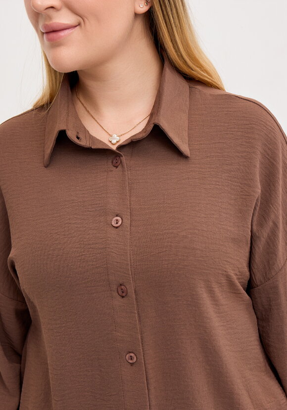 Рубашка свободного кроя с ассиметричным низом шир.  580, рис. 35