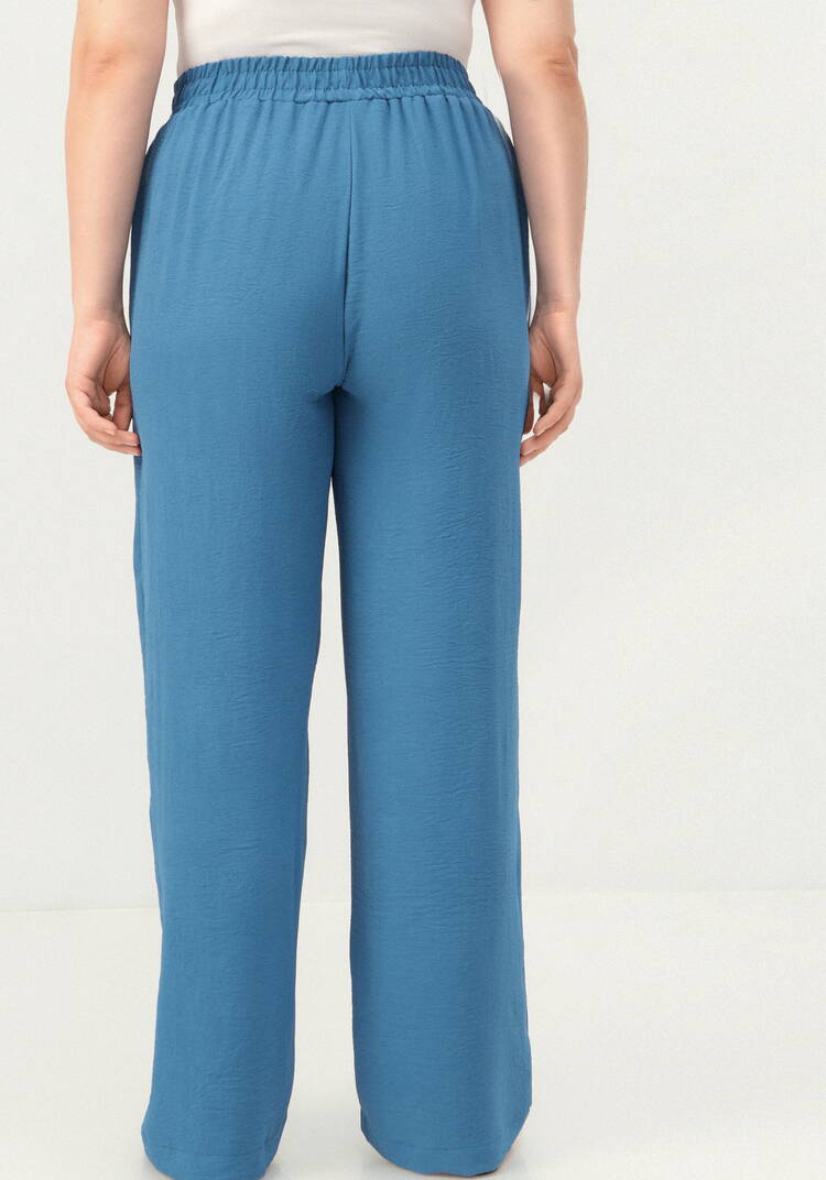 Брюки с карманами, свободного кроя шир.  750, рис. 31