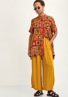 Брюки свободного кроя на резинке по низу