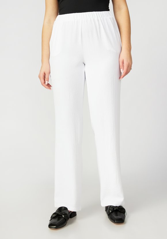 Костюм: блуза на пуговицах и брюки шир.  580, рис. 24