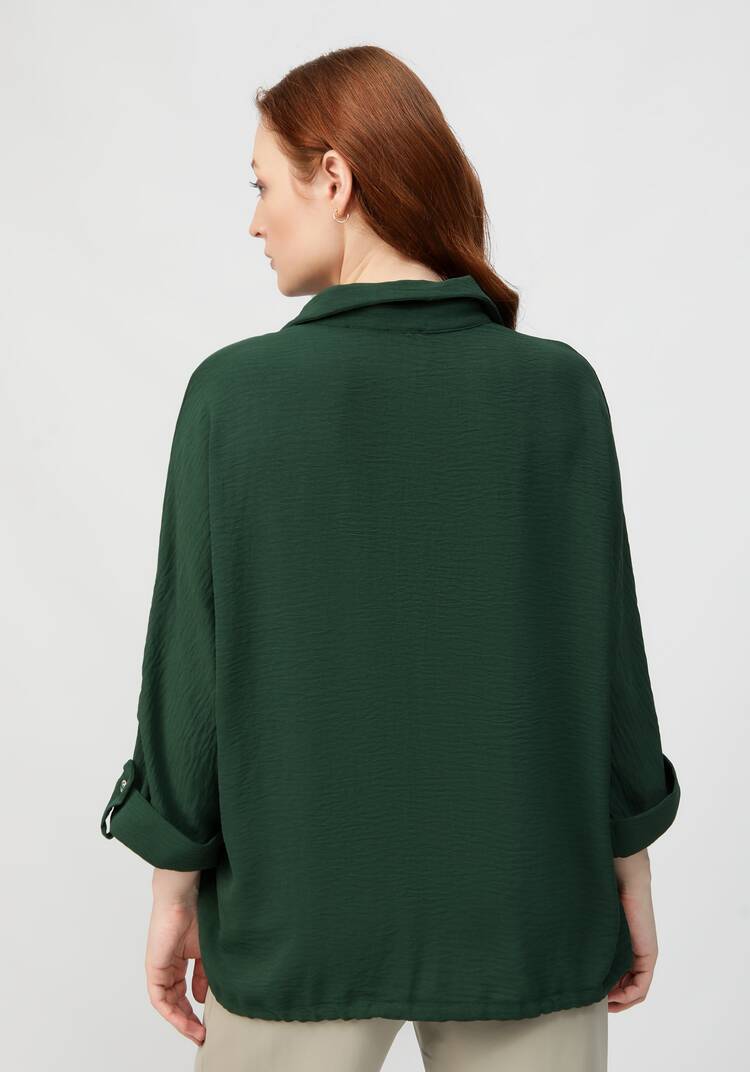 Блуза с патой на рукавах шир.  750, рис. 32