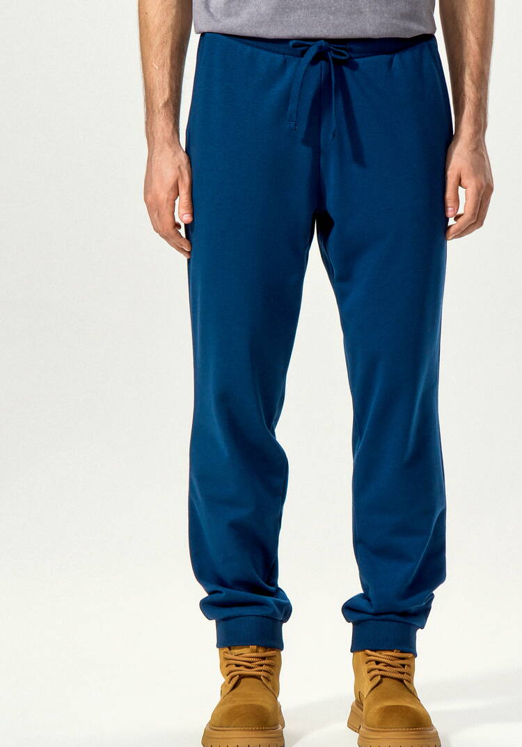 Брюки с карманами и манжетами по низу шир.  750, рис. 27