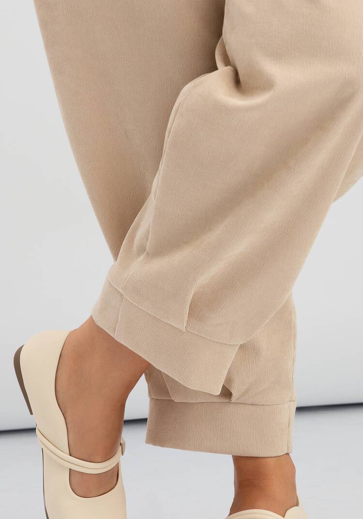 Брюки-бананы с манжетами по низу шир.  750, рис. 32