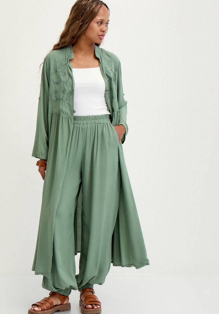 Брюки широкие с карманами на резинке по низу шир.  750, рис. 9