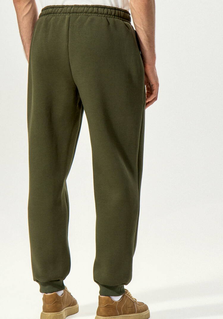 Брюки утеплённые из футера на резинке шир.  750, рис. 9