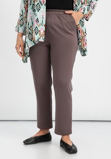 Брюки оригинального кроя на резинке